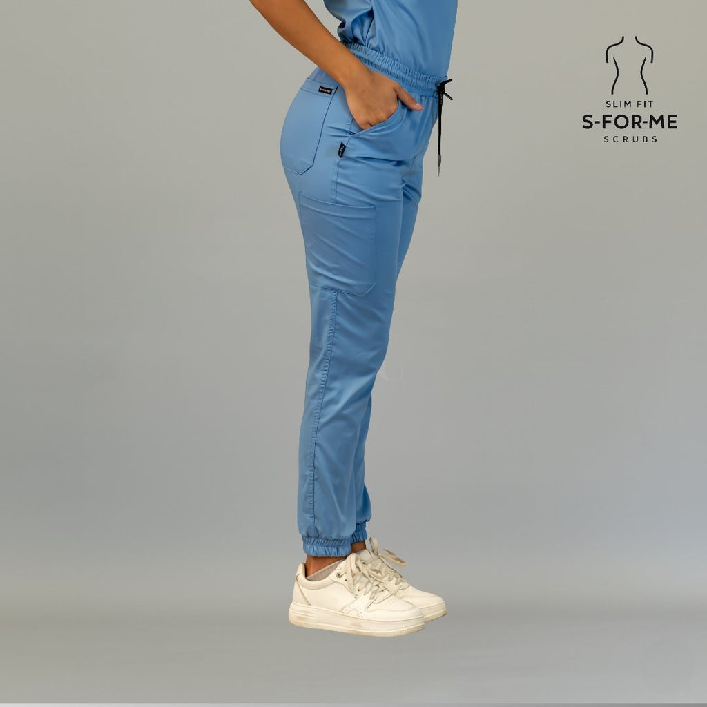 Women’s ceil blue scrub joggers side profile with drawstring waist and utility pocket