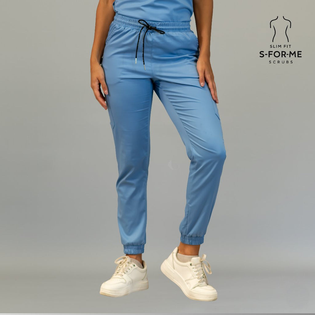 Front view of women’s ceil blue scrub jogger pants with drawstring waist and ankle cuffs