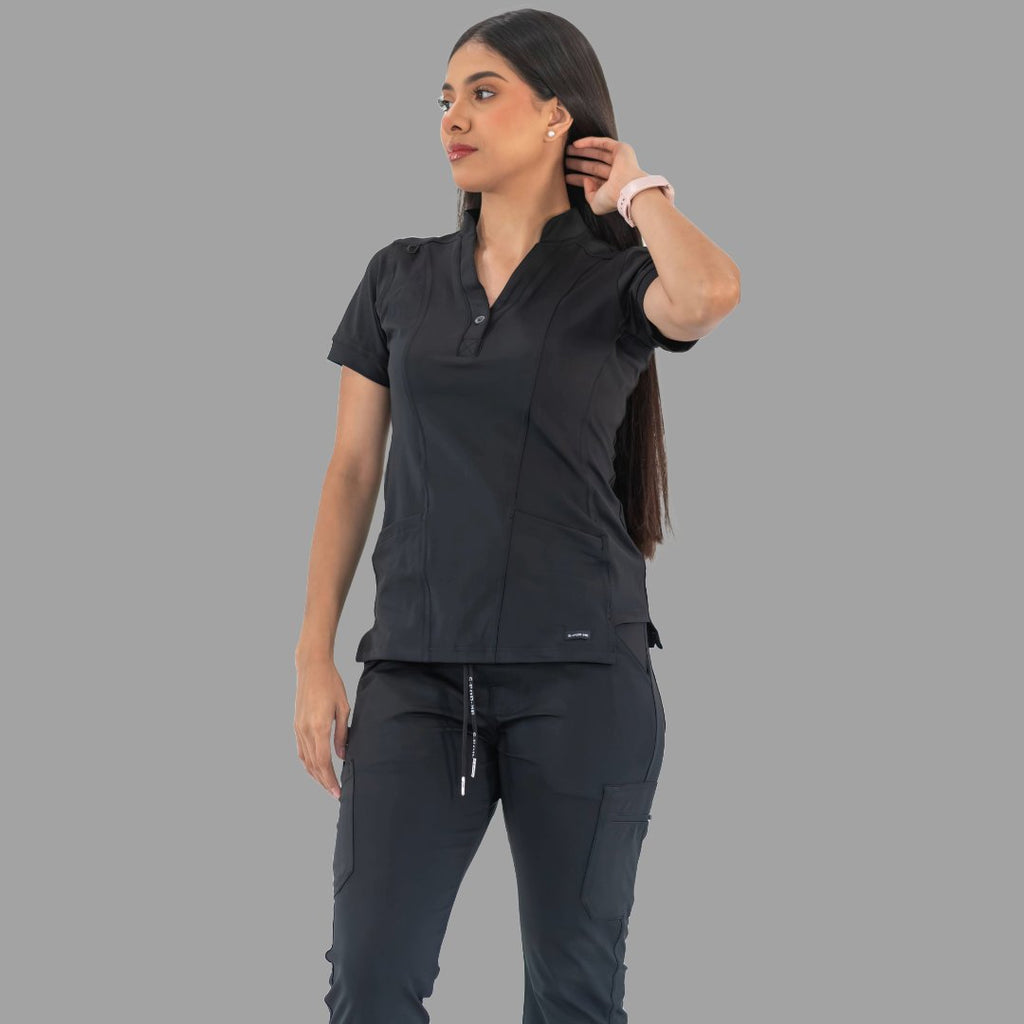 Women's black Style 930 scrub top, front view with hand in hair